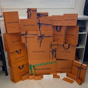 Louis Vuitton Orange Boxes and Blue-Ribbon Bags Display